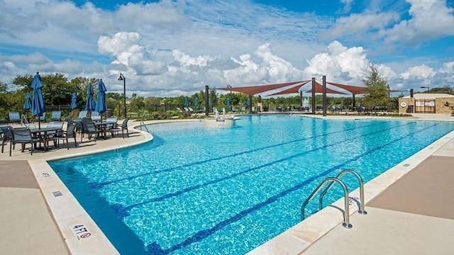 view of pool with a patio