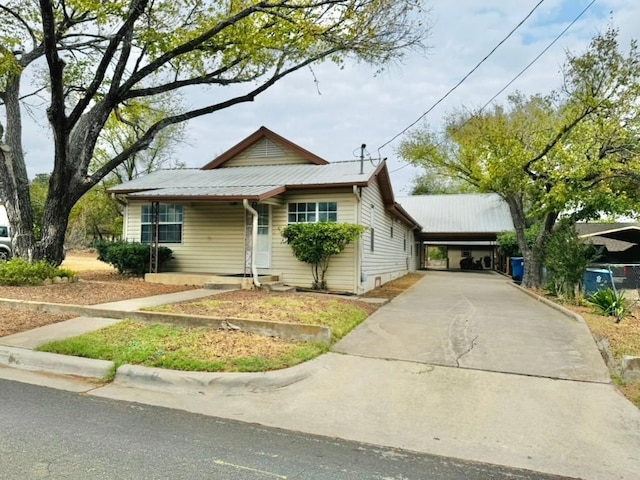 bungalow-style home featuring a carport