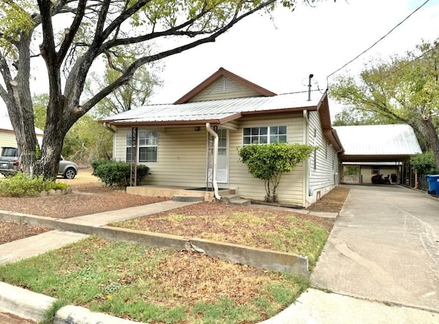 view of front of house featuring a carport