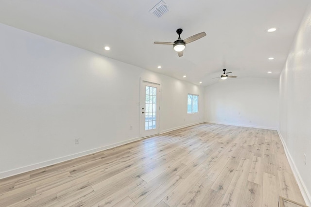 empty room featuring ceiling fan and light wood-type flooring