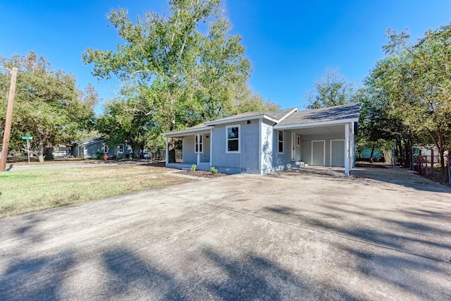 view of front of house with a carport