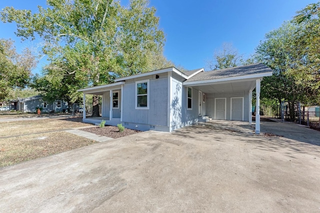 ranch-style home with a carport