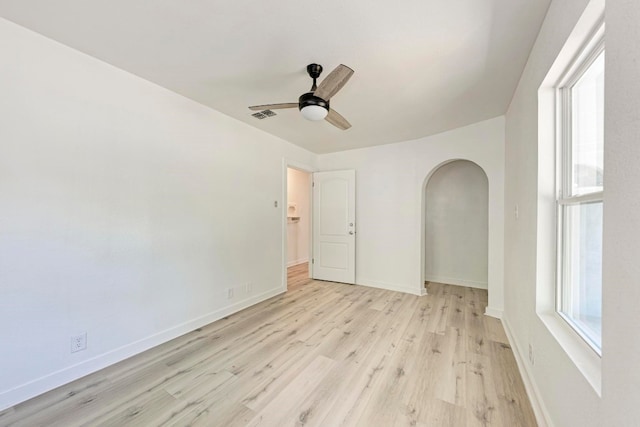 spare room with ceiling fan and light hardwood / wood-style flooring