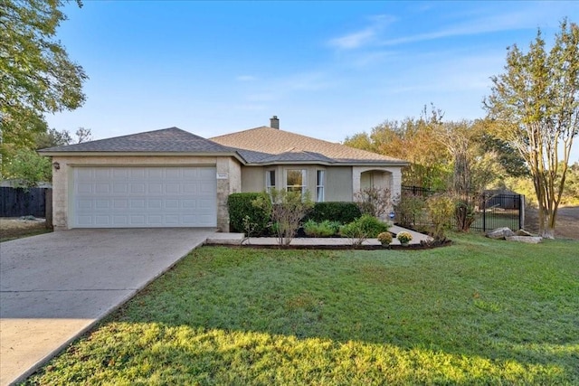 ranch-style home with a garage and a front yard