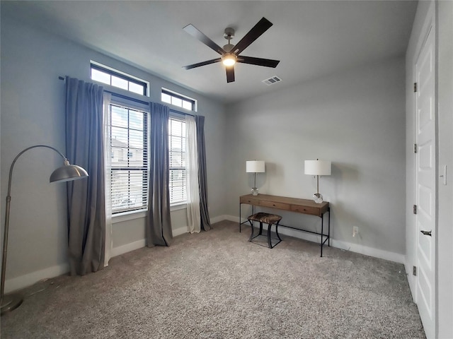 office featuring ceiling fan and carpet