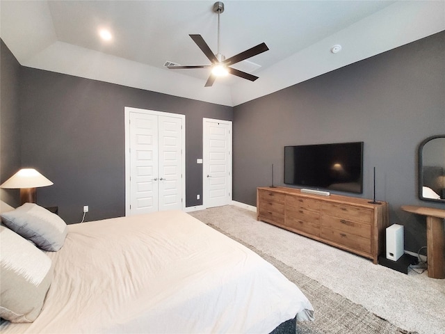 bedroom with carpet flooring, ceiling fan, and vaulted ceiling