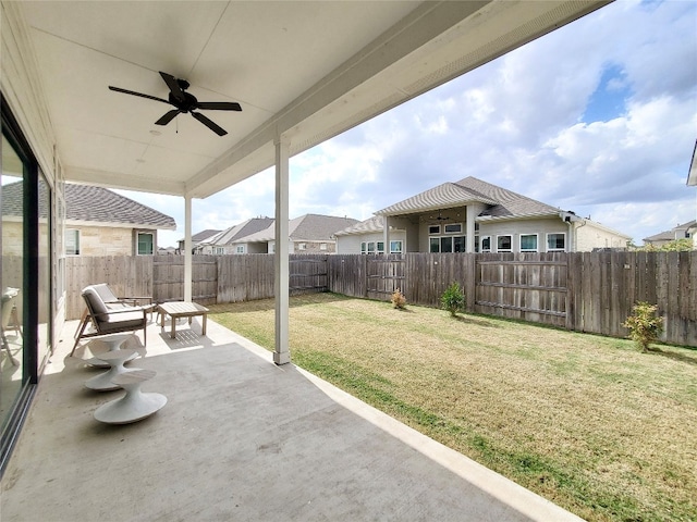 view of patio / terrace featuring ceiling fan