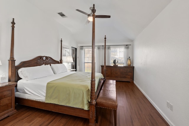 bedroom featuring lofted ceiling, ceiling fan, and dark hardwood / wood-style floors