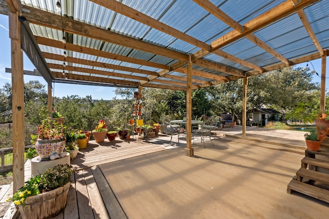 view of patio / terrace with a pergola and a wooden deck