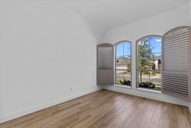 unfurnished room with light hardwood / wood-style floors