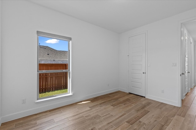 empty room featuring light hardwood / wood-style floors