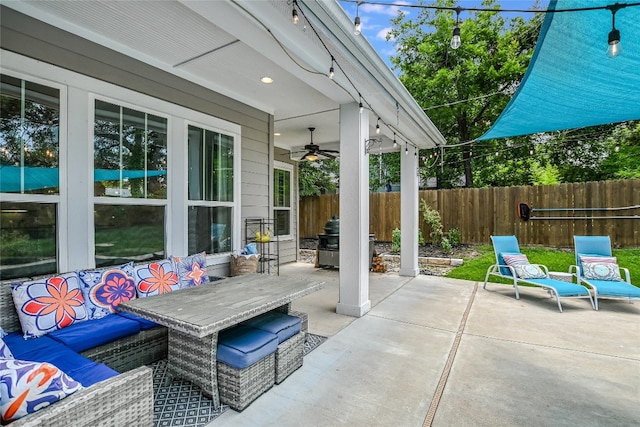 view of patio / terrace featuring ceiling fan