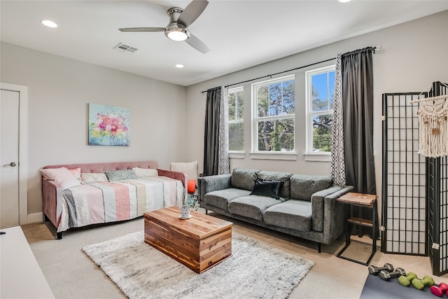 carpeted bedroom with ceiling fan