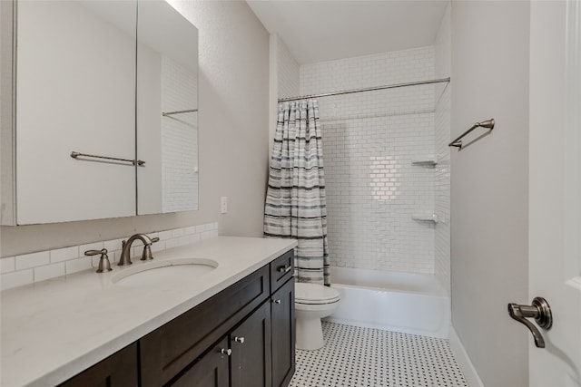 full bathroom with shower / bath combination with curtain, vanity, and toilet