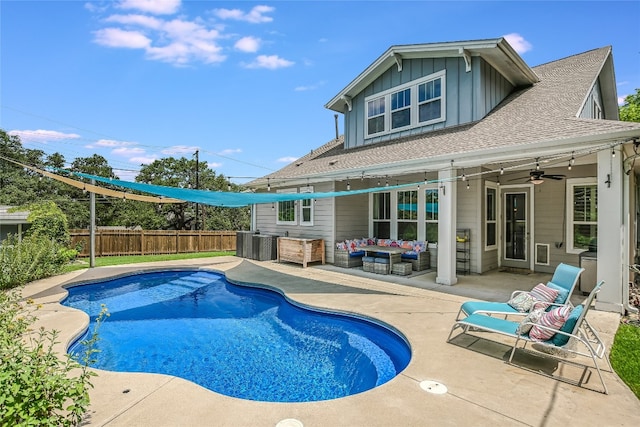 view of pool with ceiling fan, a patio, and an outdoor hangout area