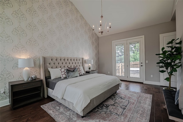 2717 Geraghty Ave, Austin, TX 78757 - bedroom with access to exterior, dark wood-type flooring, wallpapered walls, a chandelier, and high vaulted ceiling