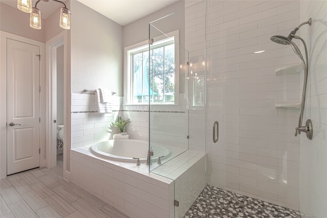 2717 Geraghty Ave, Austin, TX 78757 - full bath featuring a bath and a shower stall