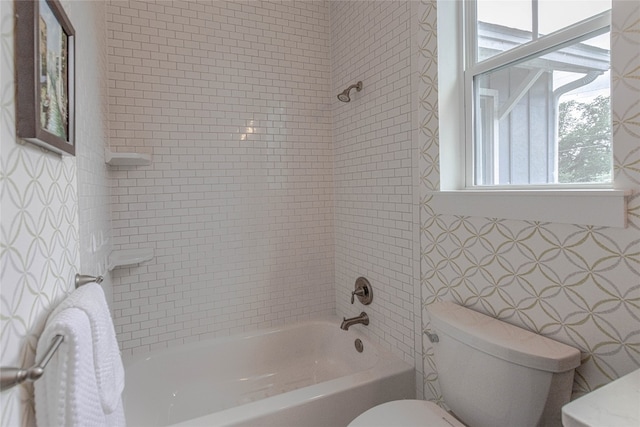 2717 Geraghty Ave, Austin, TX 78757 - bathroom featuring plenty of natural light and washtub / shower combination
