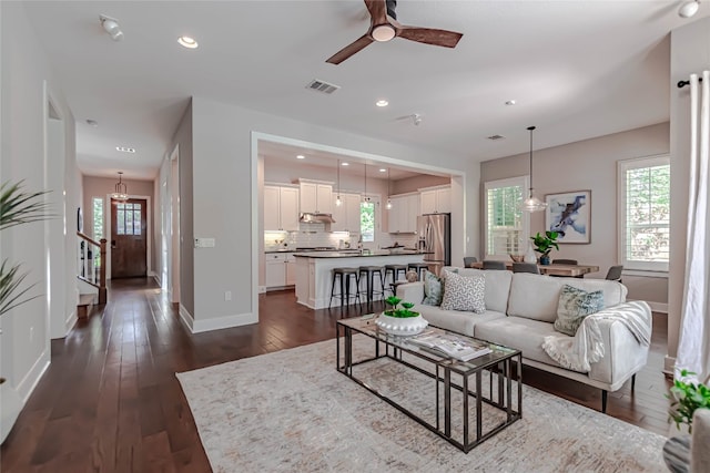 2717 Geraghty Ave, Austin, TX 78757 - living room featuring ceiling fan, dark wood finished floors, and recessed lighting