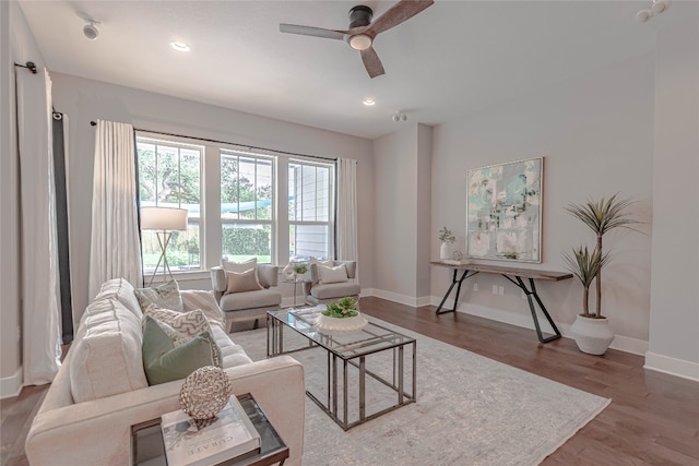 2717 Geraghty Ave, Austin, TX 78757 - living room featuring ceiling fan, wood finished floors, and recessed lighting