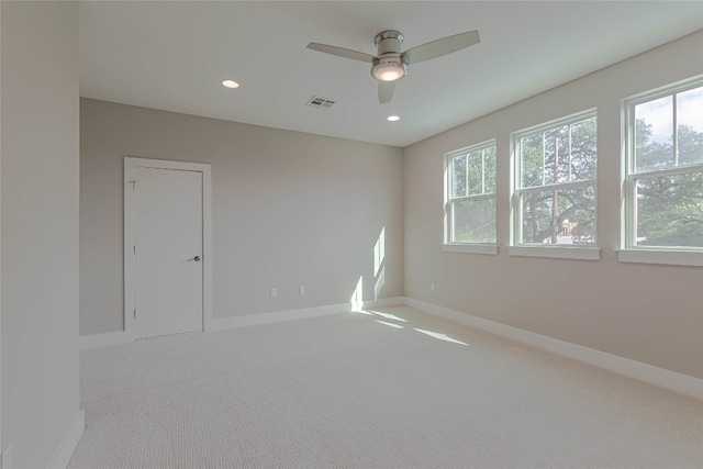 2717 Geraghty Ave, Austin, TX 78757 - empty room with healthy amount of natural light, ceiling fan, carpet, and recessed lighting