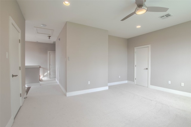 2717 Geraghty Ave, Austin, TX 78757 - unfurnished bedroom with light carpet, attic access, recessed lighting, and ceiling fan
