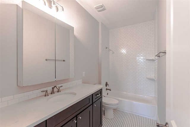 2717 Geraghty Ave, Austin, TX 78757 - bathroom featuring vanity, shower / tub combination, and tile patterned floors