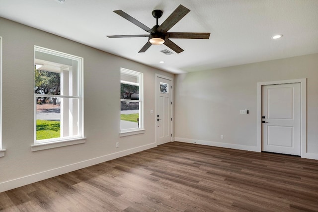 entrance foyer with ceiling fan and dark hardwood / wood-style floors