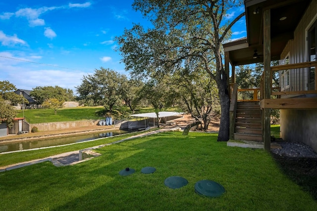 view of yard with a water view