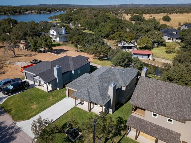 bird's eye view with a water view