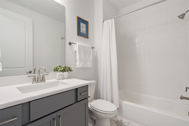 full bathroom featuring vanity, toilet, and shower / bath combination with curtain