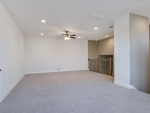 carpeted empty room featuring ceiling fan