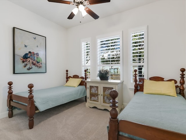 bedroom with carpet and ceiling fan