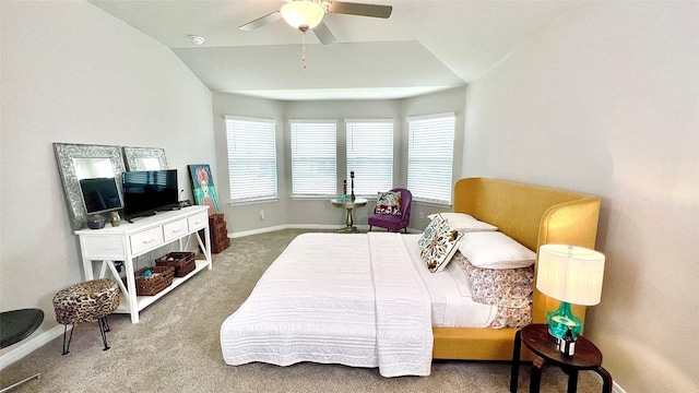 bedroom with carpet, ceiling fan, and vaulted ceiling