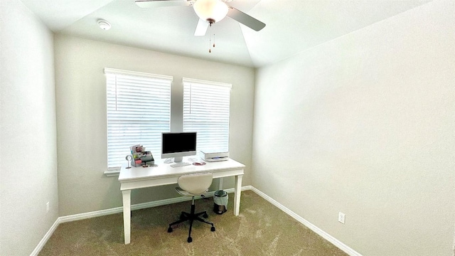 carpeted office space with ceiling fan and lofted ceiling