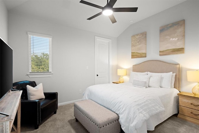 carpeted bedroom with ceiling fan and lofted ceiling