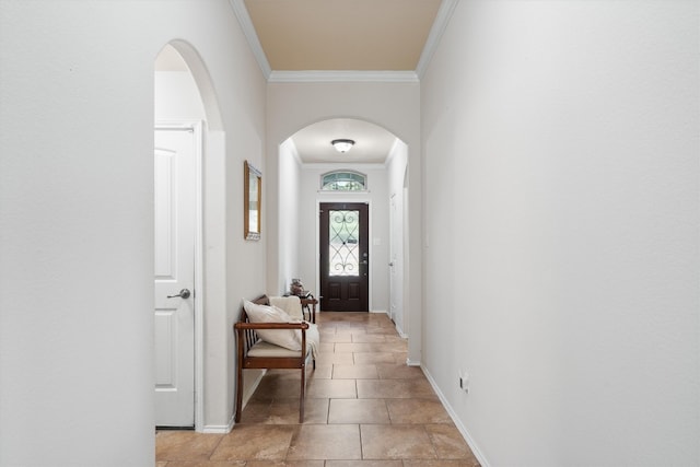 entryway featuring ornamental molding