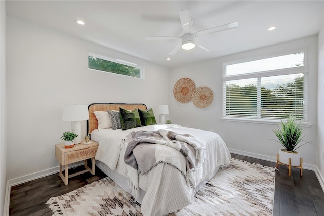 bedroom with hardwood / wood-style flooring and ceiling fan