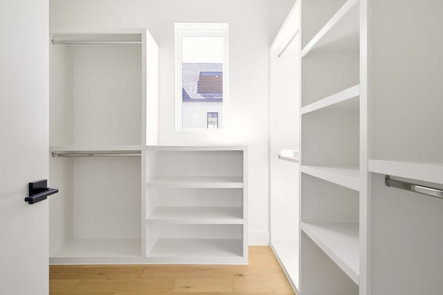 walk in closet featuring light wood-type flooring