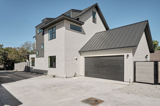 view of side of property featuring a garage