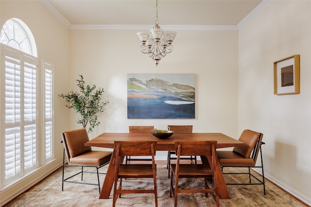 dining space with an inviting chandelier and ornamental molding