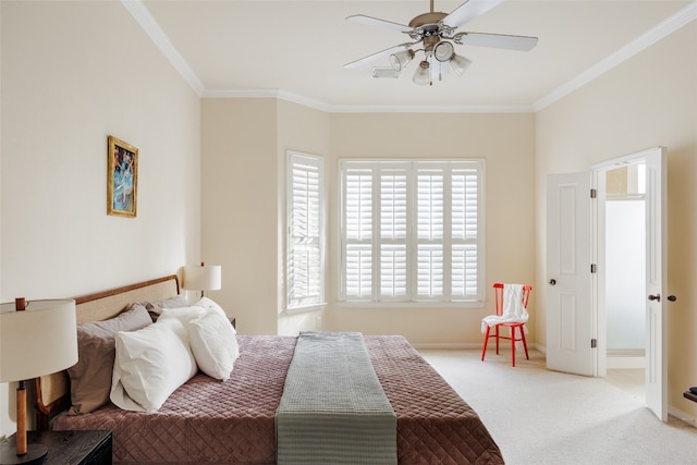 bedroom featuring ceiling fan, carpet floors, and ornamental molding