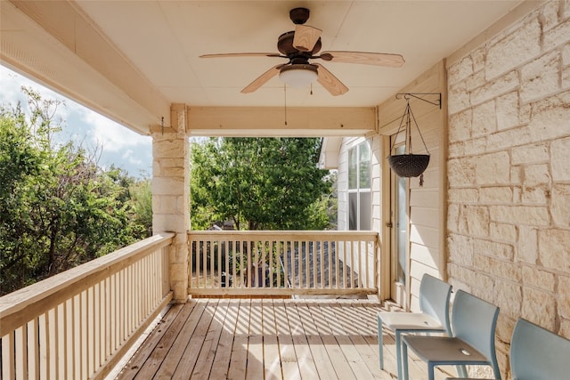 wooden terrace with ceiling fan