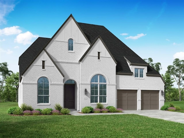 french country inspired facade featuring a garage and a front lawn