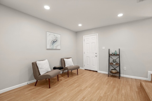 sitting room featuring light wood-type flooring