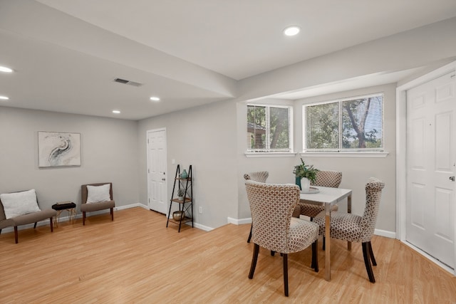 dining room featuring light hardwood / wood-style flooring