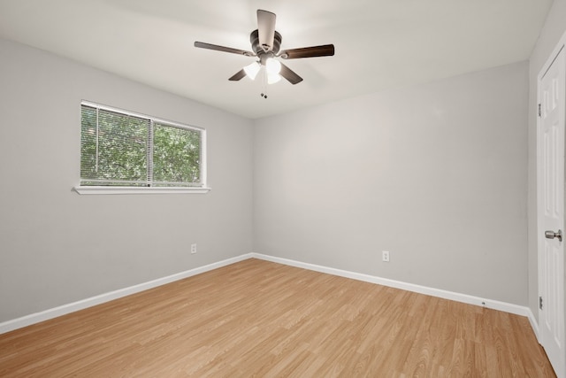 spare room with ceiling fan and light hardwood / wood-style flooring