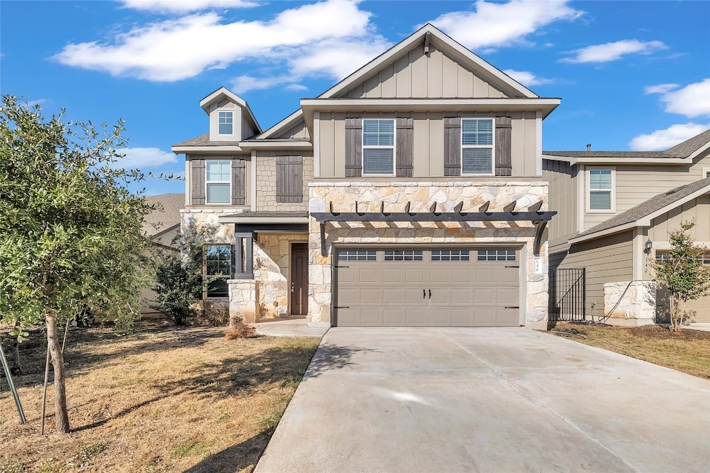 view of front of property with a garage