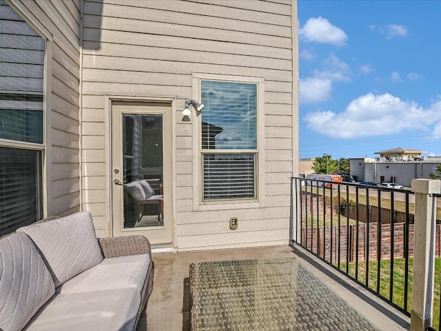 balcony featuring an outdoor living space