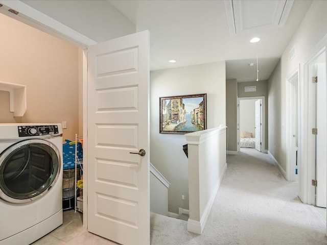 clothes washing area featuring baseboards, recessed lighting, washer / dryer, and attic access